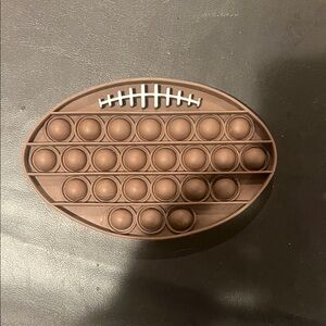Brown Football Pop It Fidget Toy